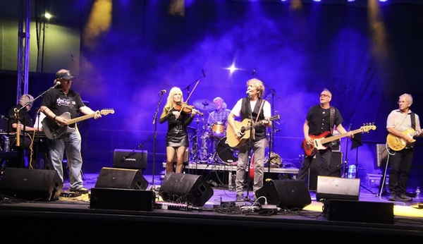 One oof Georgia's best John Mellencamp tribute bands playing on stage at a public event | Altus Entertainment